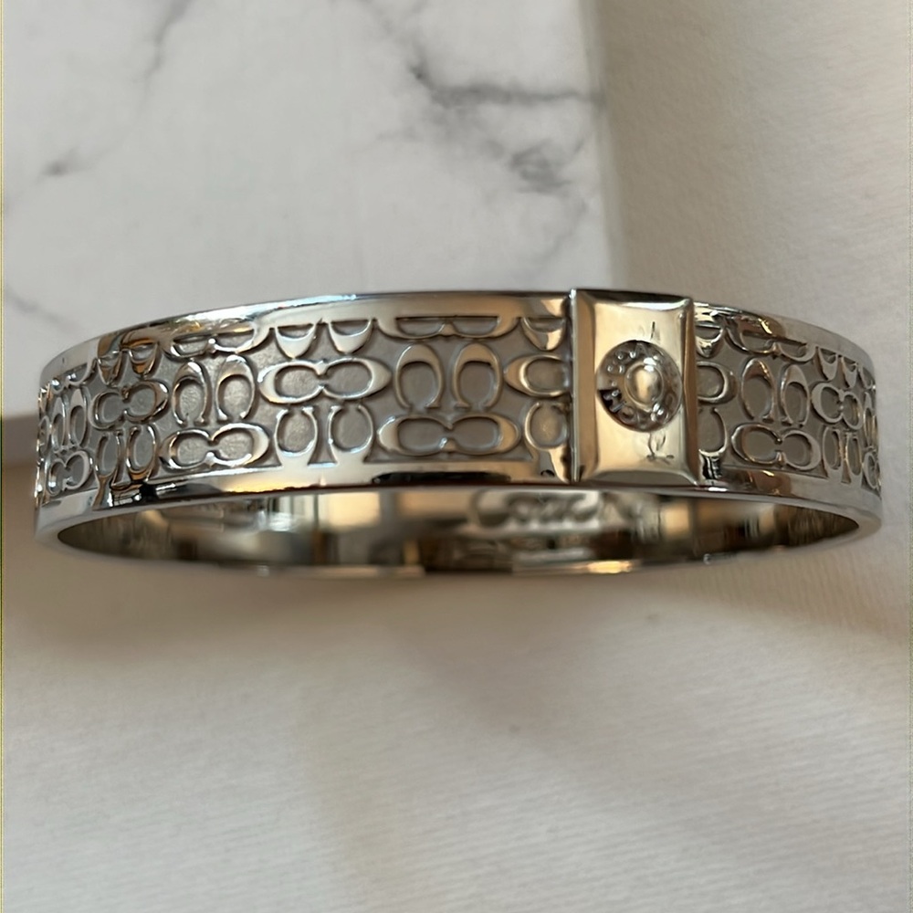 Vintage Coach 1/2”polished silver signature C bangle bracelet.